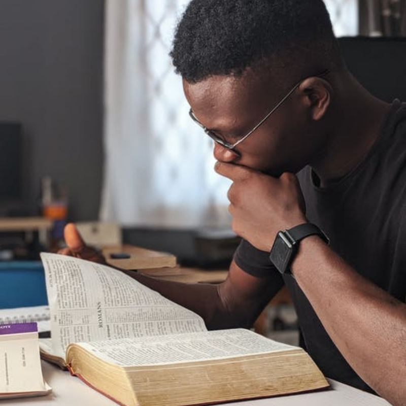 man reading book